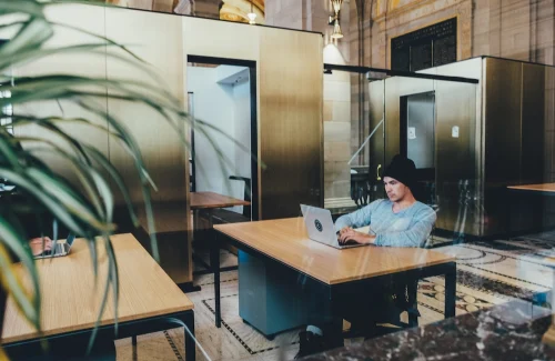 Men working on laptop